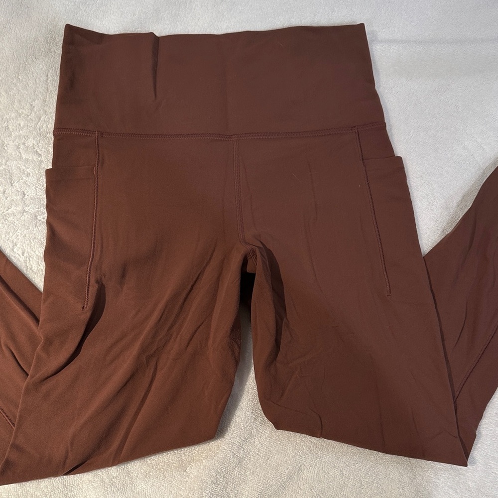 Athleta mauve / light brown salutation stash pocket High-Rise Leggings